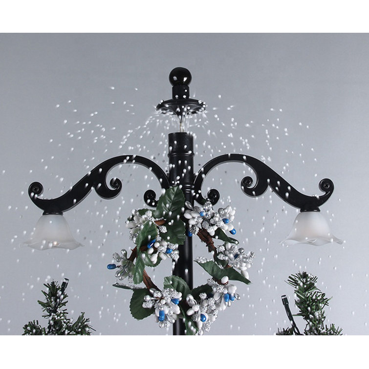 The Holiday Aisle® 29" Musical Snowing Christmas Tree, Santa Family Scene With Green Umbrella